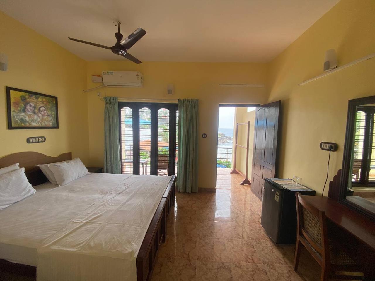 Karma Beach Resort Kovalam Pokoj fotografie