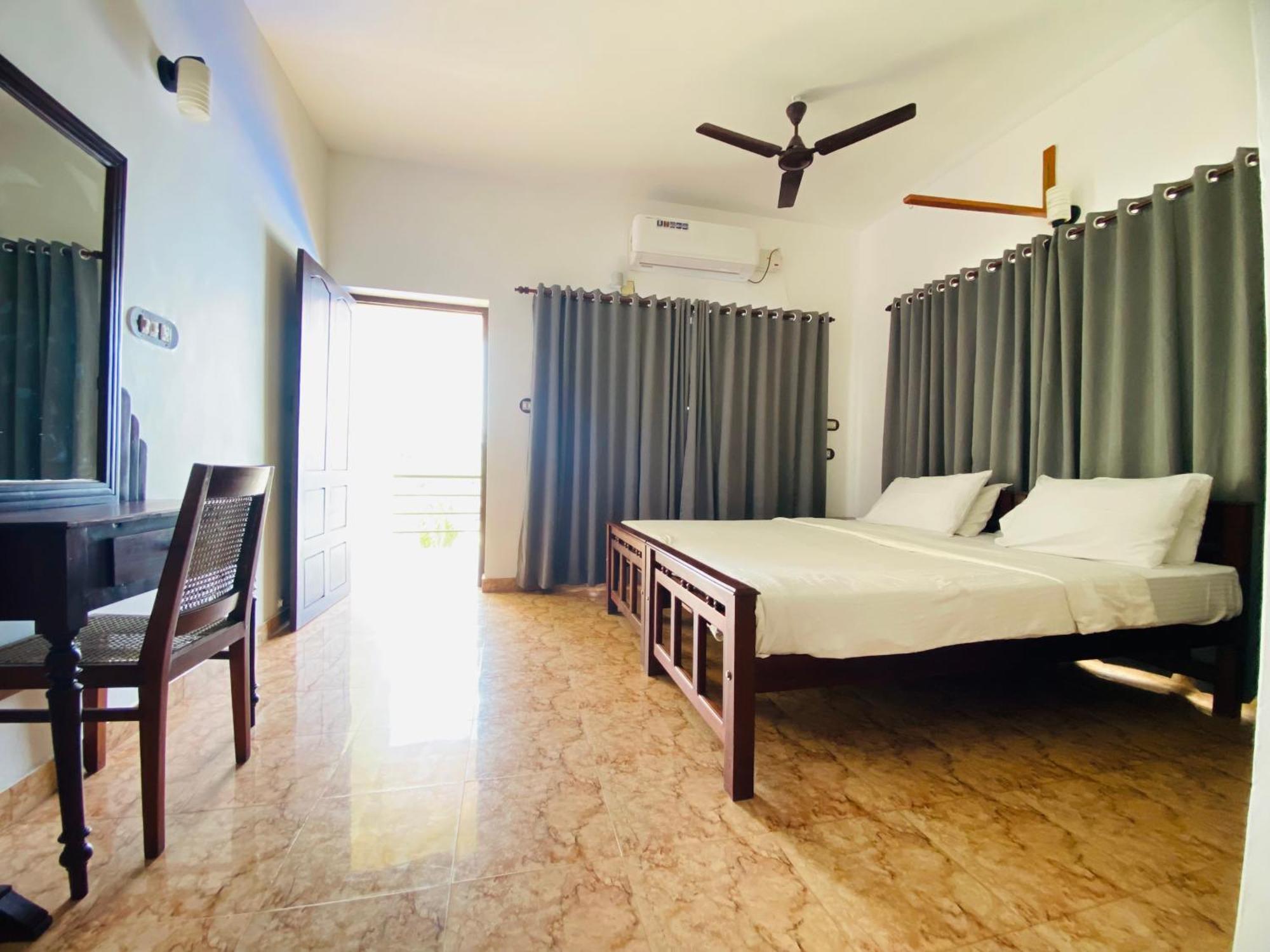 Karma Beach Resort Kovalam Pokoj fotografie