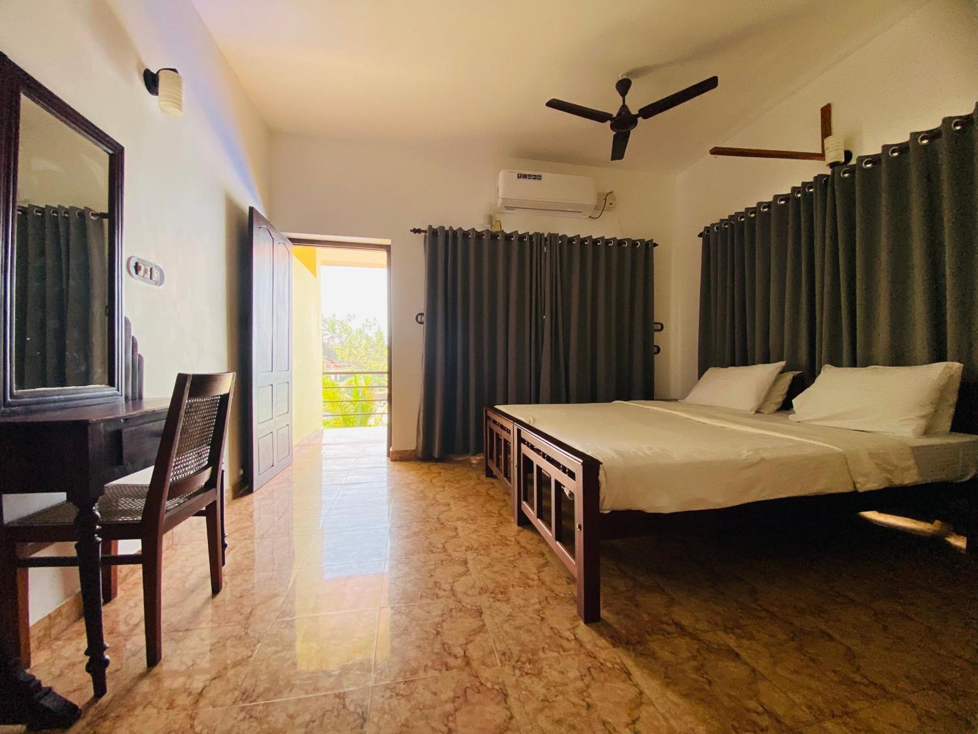 Karma Beach Resort Kovalam Pokoj fotografie